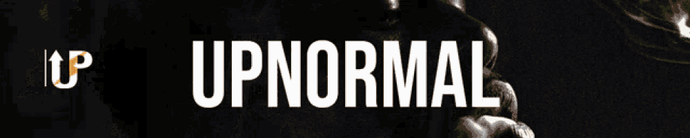 a man wearing sunglasses with the words upnormal written below him