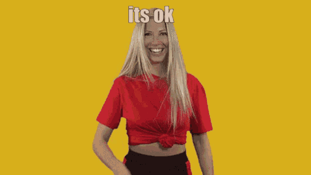 a woman in a red shirt says it 's ok cuov clapped u on a yellow background