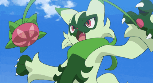 a green and white cartoon character with a red flower in its mouth