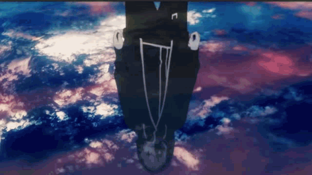 a man in a suit is upside down in the air
