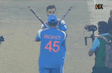 a cricket player with the number 45 on his jersey