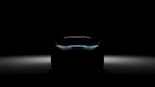 a car is lit up in the dark and says tasdemir mekanik on the top