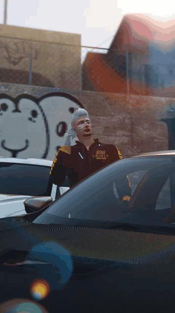 a man standing next to a car with a jacket that says ' snoop dogg '