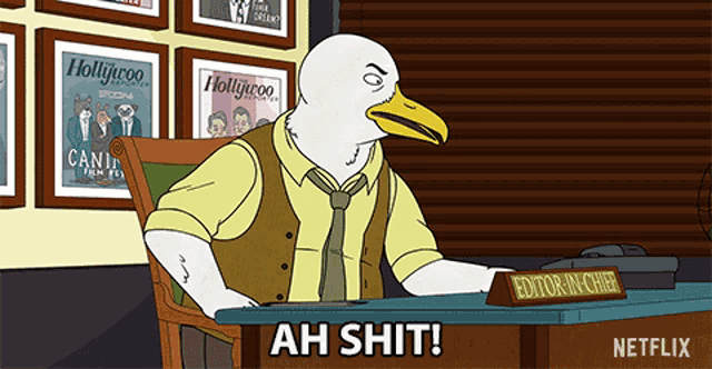 a cartoon character sitting at a desk with a sign that says " editor in chief "