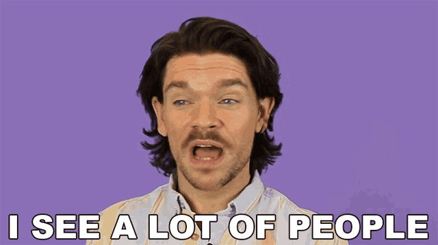 a man says i see a lot of people in front of a purple background