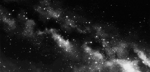 a black and white image of a galaxy with stars