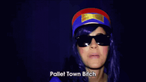 a woman wearing a pink wig and sunglasses is covering her mouth with her hand and says pallet town bitch