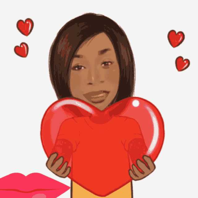 a woman in a red sweater is holding a heart in her hands
