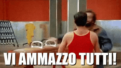 a man in a red tank top is standing next to a woman in a bathtub and says vi ammazzo tutti !