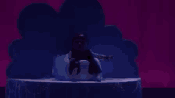 a baby in a pirate outfit is sitting on a throne