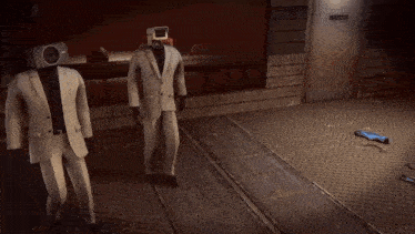 two men in suits with cameras on their heads are walking down a hallway