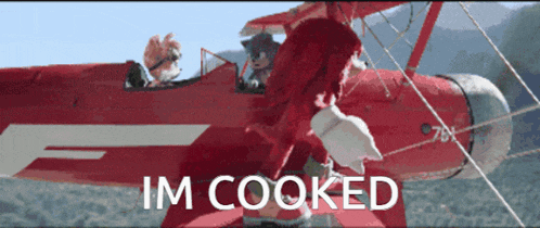 a red airplane with the words im cooked on the bottom