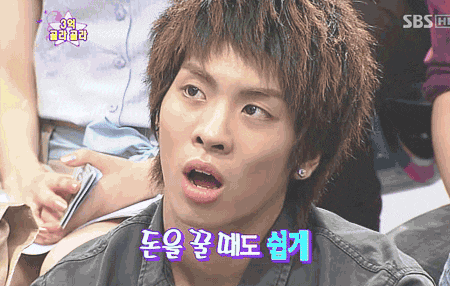 a close up of a person 's face with a sbs logo in the corner