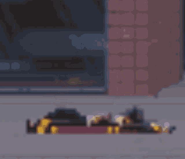 a pixel art of a gun with smoke coming out of the barrel