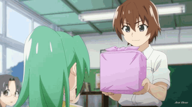 a boy in a white shirt is holding a purple gift box