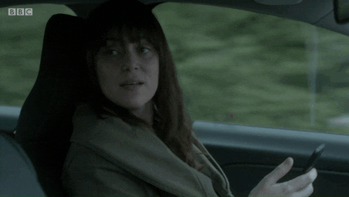 a woman sitting in a car with the words what and you 're different somehow are you on the bottom