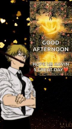a man in a suit and tie is standing in front of a poster that says good afternoon