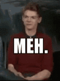 a man in a red shirt is sitting in front of a sign that says meh