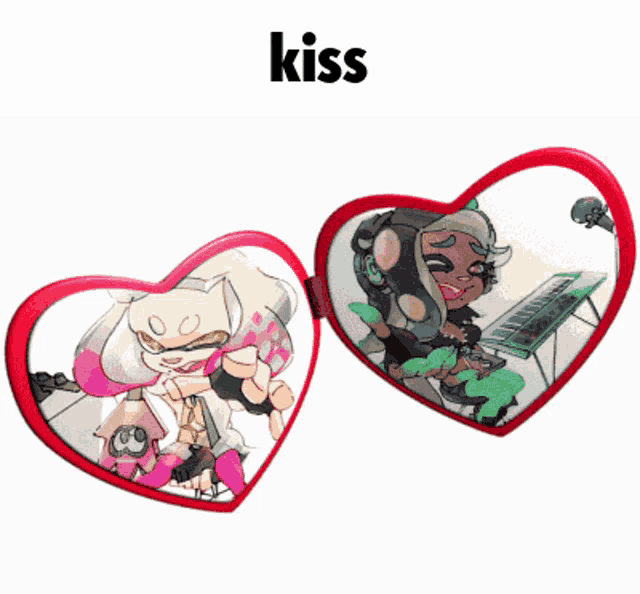 a couple of heart shaped mirrors with the word kiss on the bottom