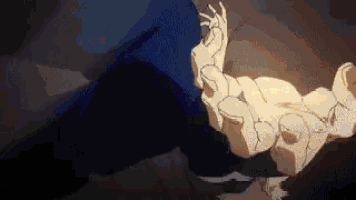 a person is laying on the ground with their arms outstretched in a dark room .