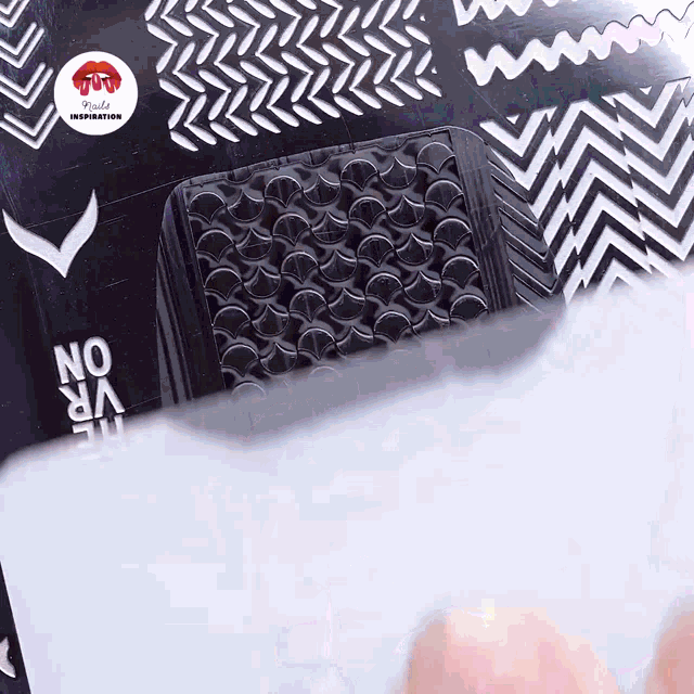 a black and white item with the word no on the bottom