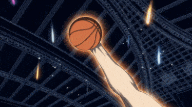 a basketball is being thrown in the air by a person 's arm