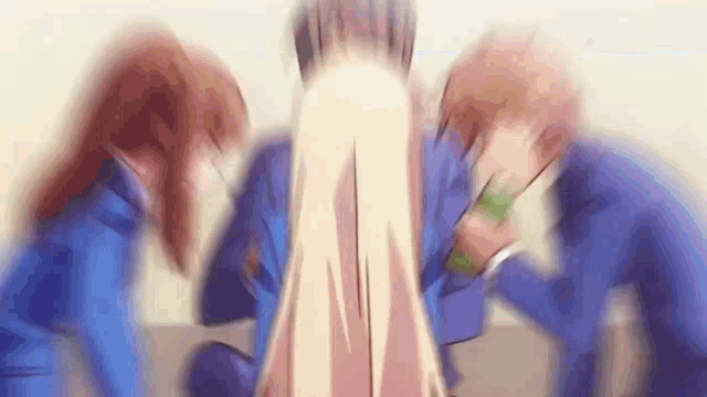 a group of anime characters are standing next to each other and talking .