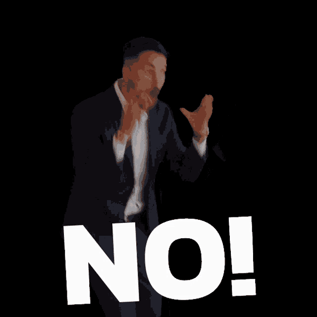 a man in a suit and white shirt says no