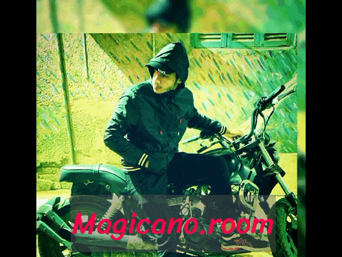a picture of a man sitting on a motorcycle with the words magicano room on the bottom right