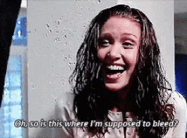 a woman is laughing and saying oh so is this where i 'm supposed to bleed ?