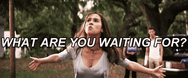 a woman with her arms outstretched and the words what are you waiting for behind her