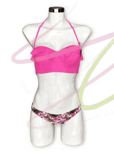 a mannequin is wearing a pink bikini top and floral bottoms