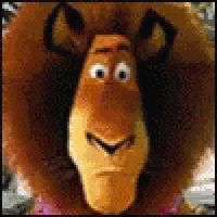 a close up of a cartoon lion 's face with a funny face .