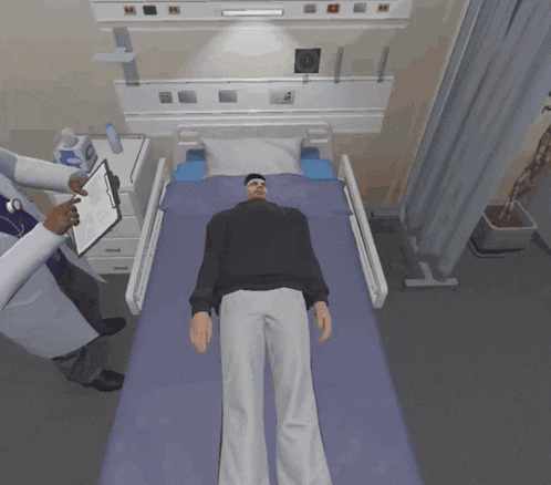 a man is laying in a hospital bed while a doctor looks at a clipboard