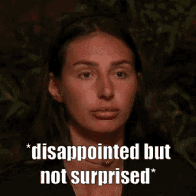a woman with disappointed but not surprised written below her face