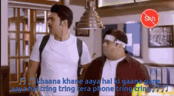 two men are standing next to each other with the words " aaya hai tring tring tera phone tring tring "
