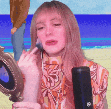 a woman is applying makeup in front of a mirror while a man stands behind her