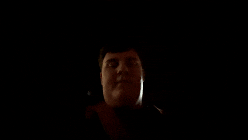 a dark room with a few lights on and a sticker that says ' a ' on it