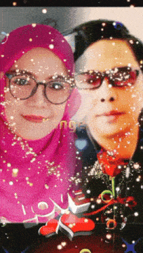 a woman in a pink hijab and a man in sunglasses pose for a photo