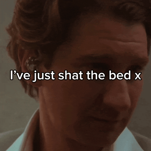 a close up of a man 's face with the words " i 've just shat the bed x "