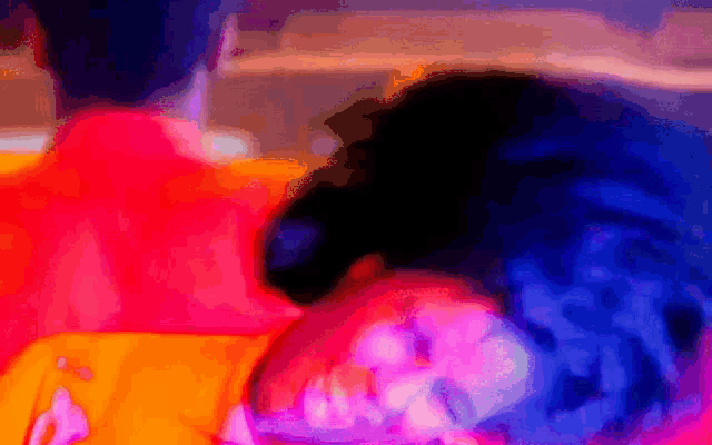 a colorful painting of a man and a woman laying on a couch