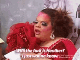 a drag queen in a red dress says who the fuck is heather