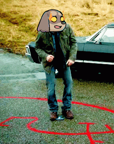 a man with a cartoon dog on his head is standing in front of a car