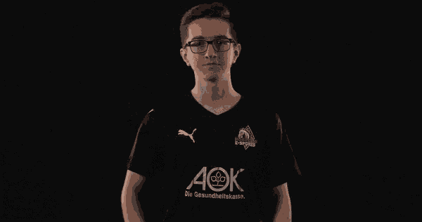 a young man wearing glasses and a black shirt that says aok