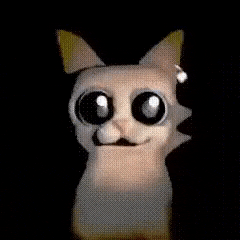 a close up of a stuffed animal with big black eyes and a smile on its face .