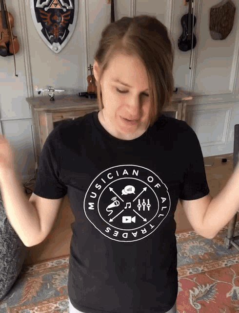 a woman wearing a musician of all trades shirt