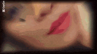 a close up of a woman 's face with the word copcut visible