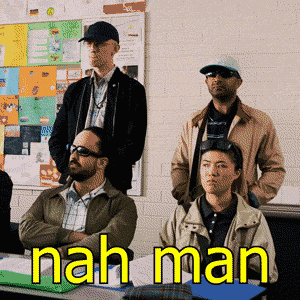 a group of people are sitting in a classroom with the words nah man written in yellow