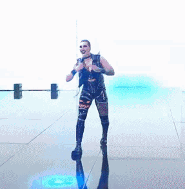 a man in a costume is dancing on a stage