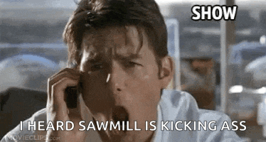 a man is yawning while talking on a cell phone in a movie .
